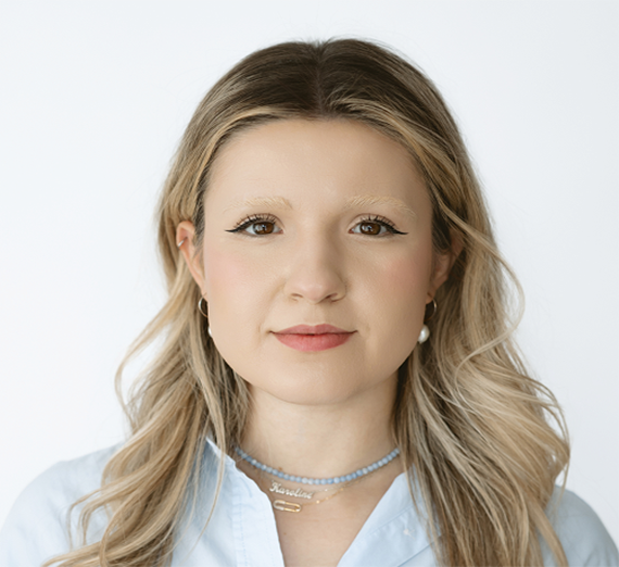 Katie and Ryan Harnetiaux stand in the Gonzaga Hall of Honor